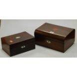 A Victorian rosewood mother of pearl laid workbox of plain rectangular form having stripped back