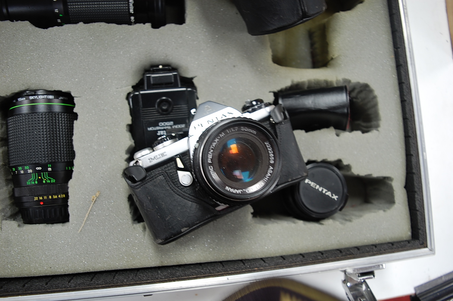 A Pentax ME series camera, in fitted case with various lenses and accessories; together with various - Image 7 of 8