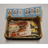 A collection of various cigarette and collectors cards, to include John Player & Sons RAF badges and