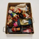 A collection of miniature childrens' dolls