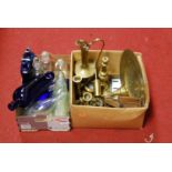 Two boxes of miscellaneous items, to include Bristol Blue glass bottles, brass candlesticks etc