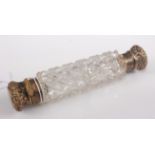 A Victorian hobnail cut glass double ended scent bottle having gilt metal hinge and screw caps 13cm