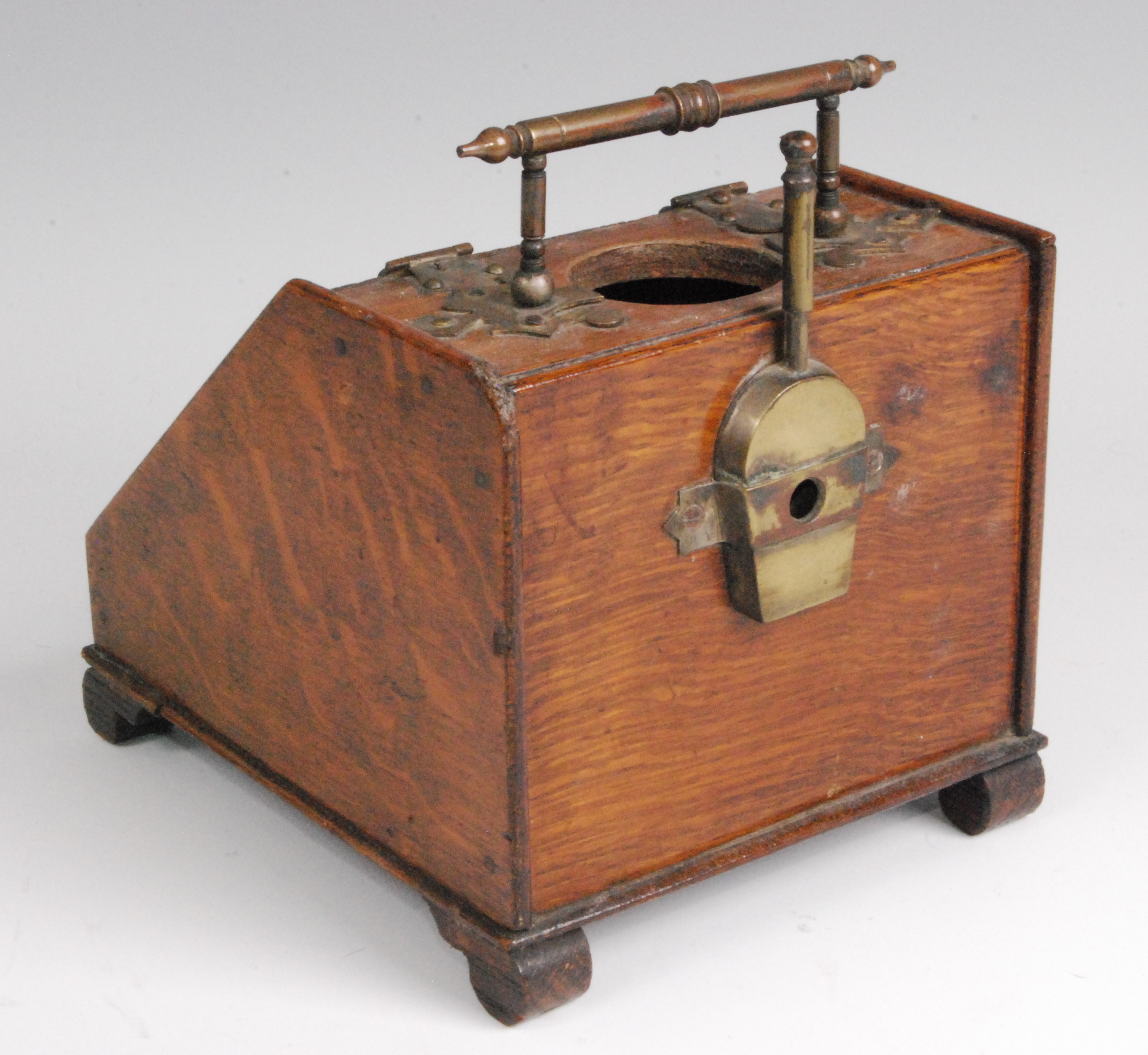 A late Victorian oak and brass mounted smokers companion, in the form of a coal-bin, the hinged - Image 2 of 2