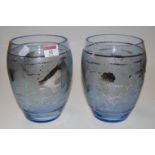 A pair of blue tinted glass vases, of barrel shape, having silvered fish decoration, h.19cm