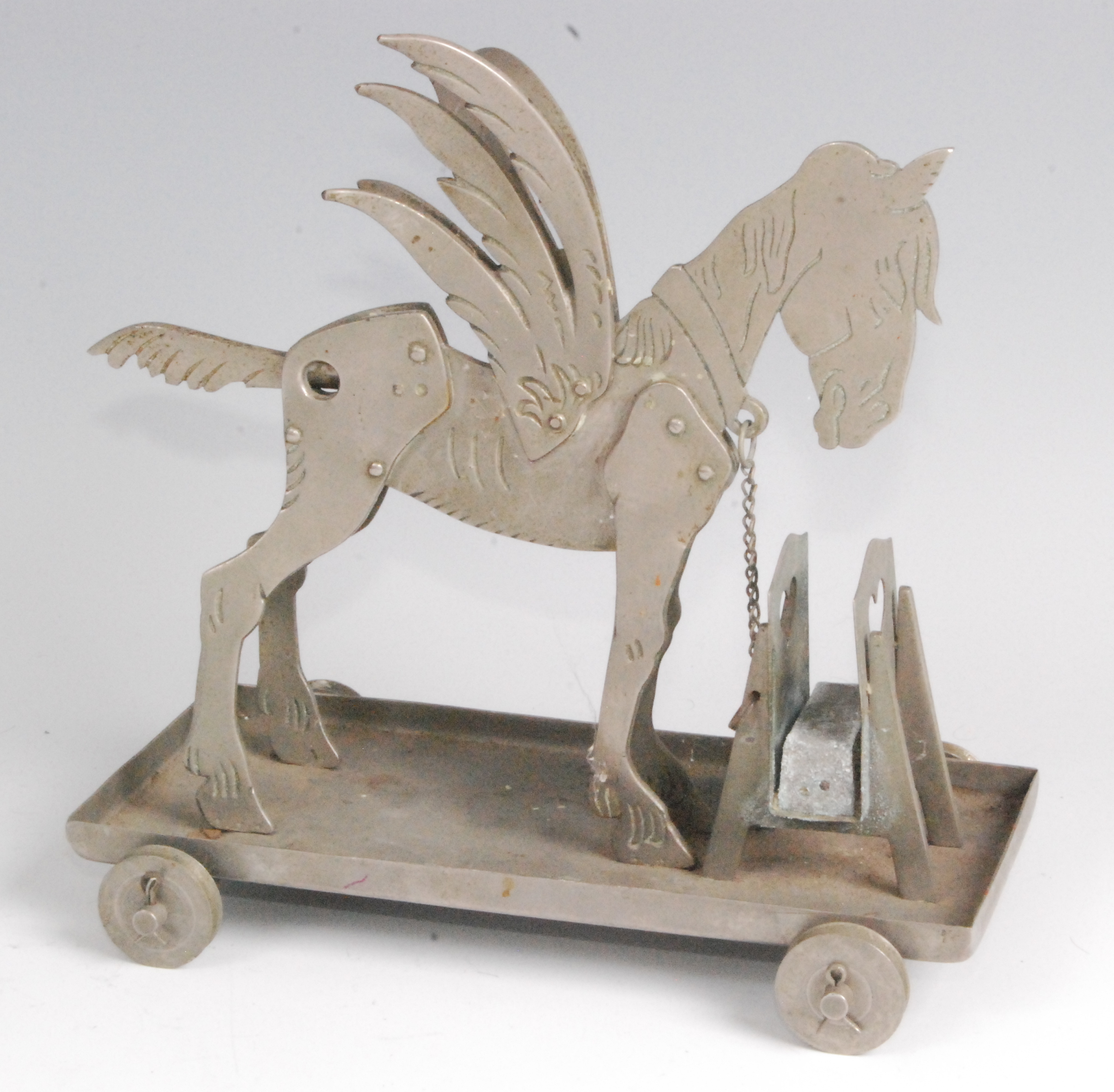 An early 20th century German novelty table cigar cutter, modelled as Pegasus the winged horse,