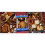 Three boxes of miscellaneous treen items, to include various biscuit barrels and covers, egg-cups,