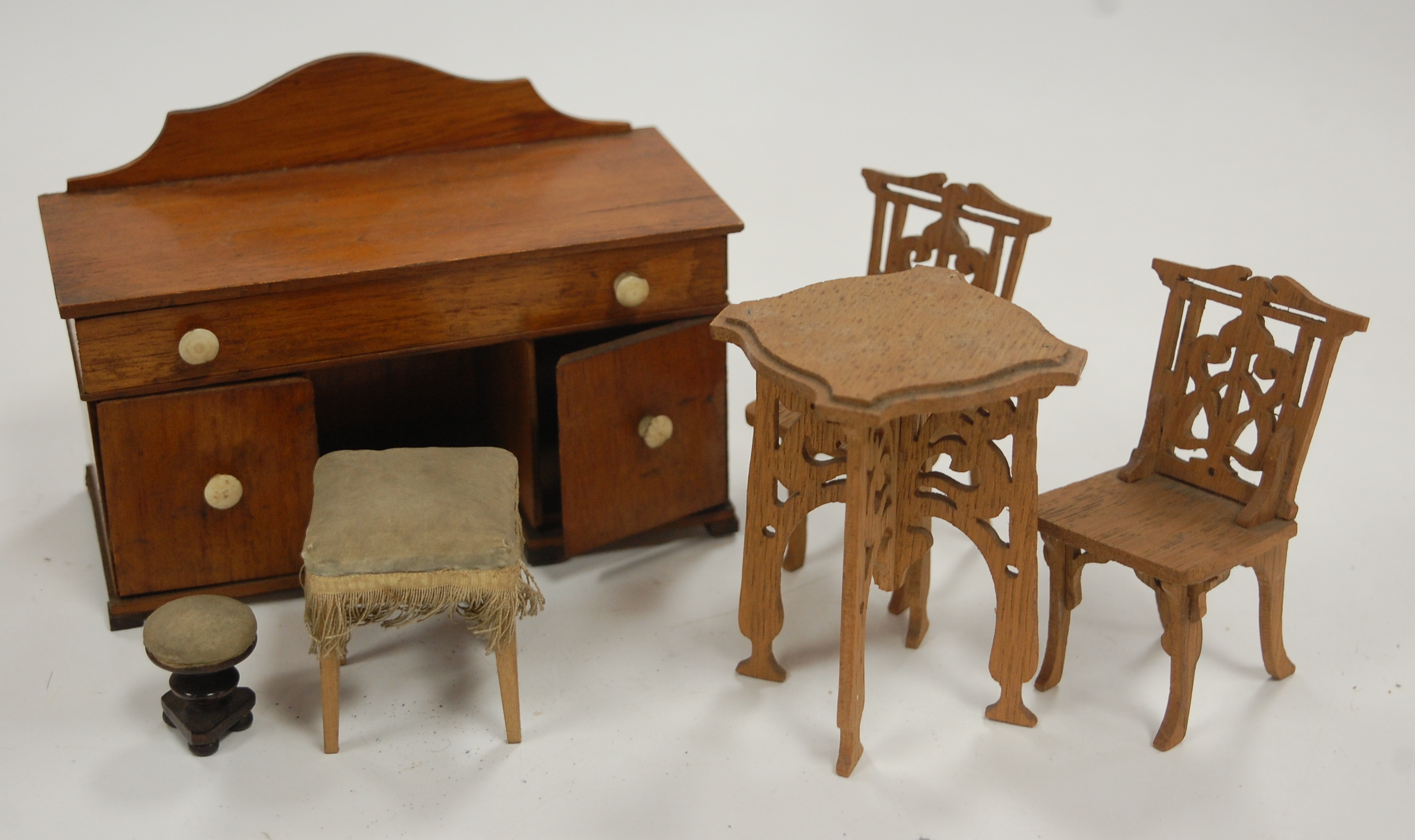 A large collection of dolls house furniture and accessories, briefly to