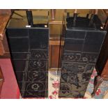 A pair of contemporary bevelled black mirrored glass square pedestals (one with damages to top