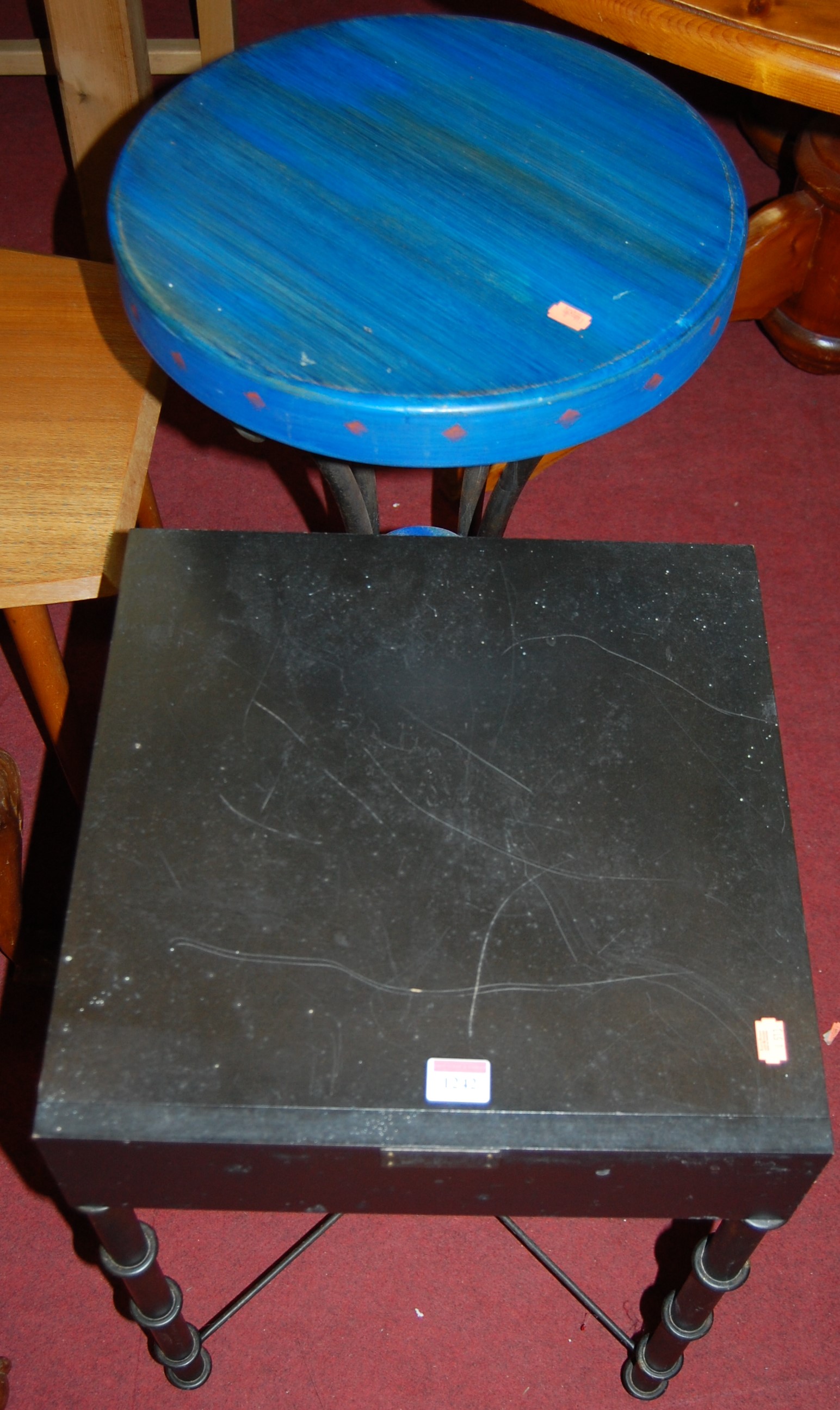A contemporary black painted metal single drawer side table; together with a blue painted metal