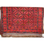 A Caucasian small woollen red ground prayer rug, with flatweave ends, 110 x 81cm