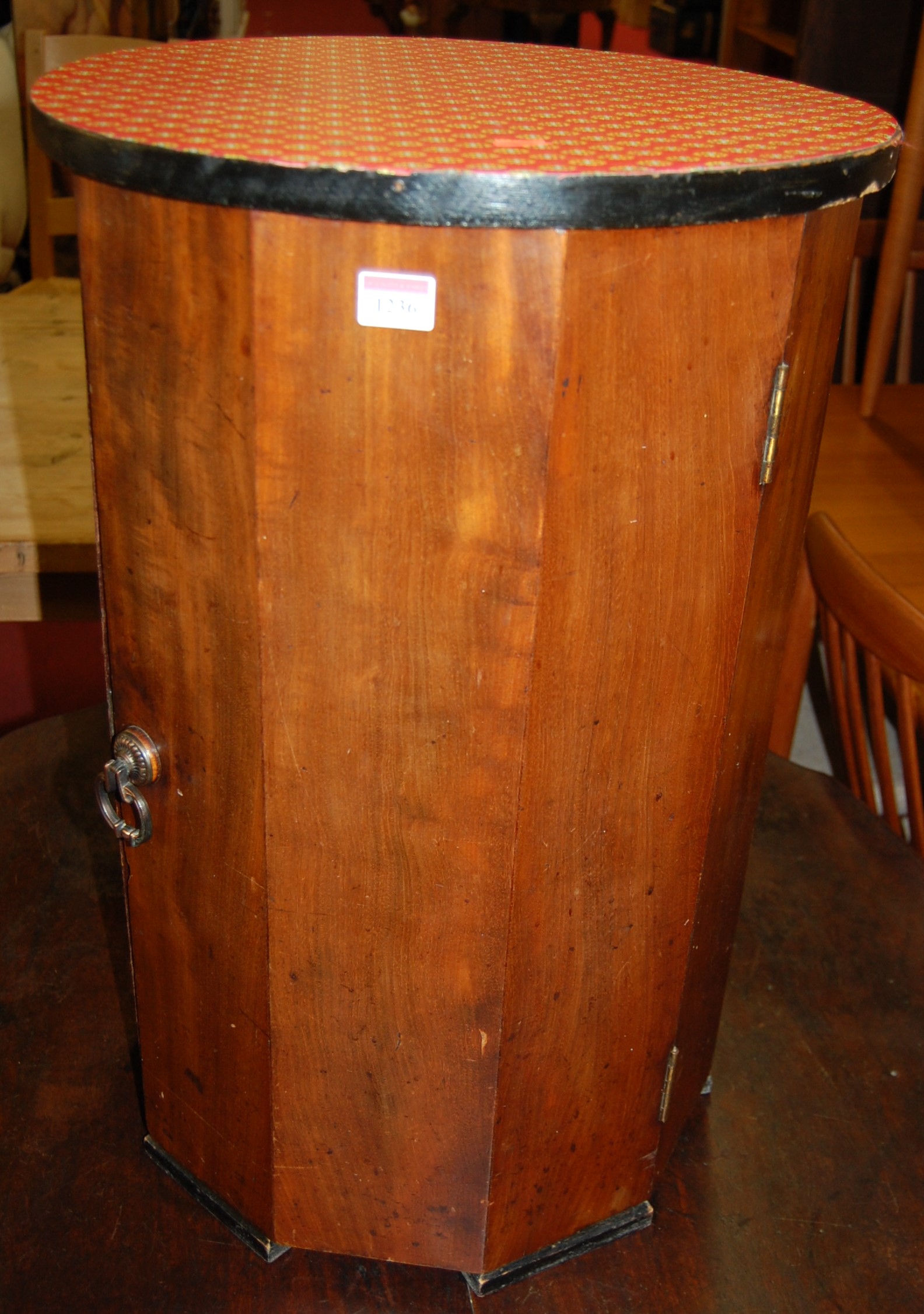 A 19th century mahogany and later circular topped single door bedside cupboard, dia.43.5cm