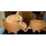 A pair of contemporary wicker elephant shaped baskets, together with one other larger example (3)