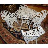 A set of four white painted cast aluminium tub garden elbow chairs; together with a near-matching