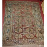 A Persian woollen Bokhara rug (heavily worn), 172 x 120cm