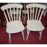 A set of six contemporary cream painted beech slatback kitchen chairs