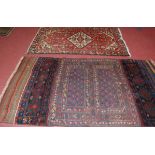 A Turkish woollen blue ground Kelim rug, with flatweave ends, 195 x 110cm; together with an