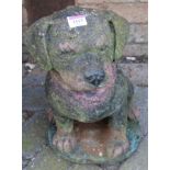 A composite garden ornament in the form of a seated labrador puppy, height 46cm