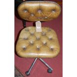 A 1980s chrome framed and green leather buttoned and studded upholstery pad back and seat swivel