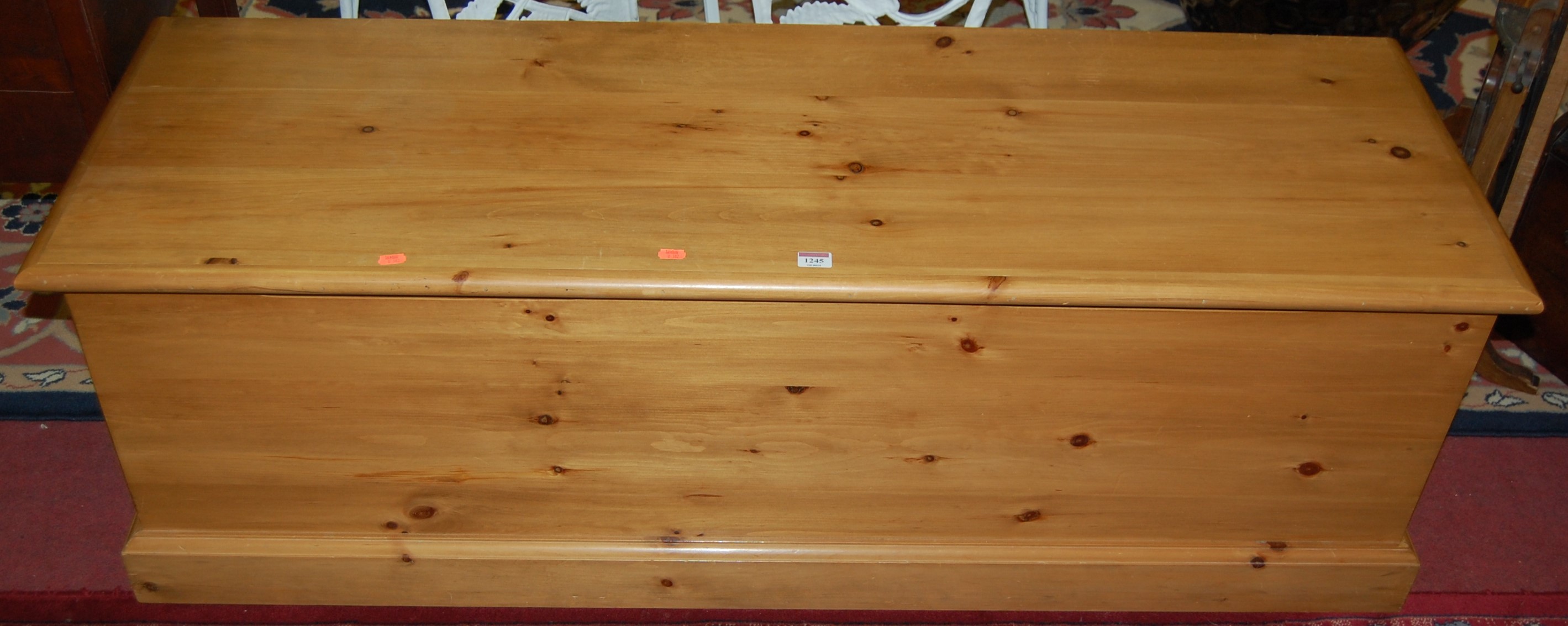 A modern pine long hinge topped blanket box, w.140cm