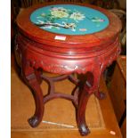 A Chinese contemporary hardwood and floral enamel inset circular urn stand, dia.44cm