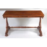 A Victorian figured walnut centre table, the top having a moulded edge and rounded corners, raised