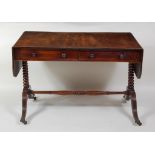 A Regency mahogany and rosewood crossbanded sofa table, having single real and single dummy drawer