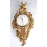 A mid-19th century French Rococo Revival gilt bronze cartel clock, surmounted with a mandolin