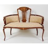 A Sheraton Revival mahogany and inlaid salon settee, having a rosewood and marquetry inlaid