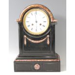 A Victorian polished slate mantel clock, the white enamel dial signed 'E&E Emanuel, The Hard,