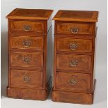 A pair of figured walnut and crossbanded four-drawer bedside chests, each with feather-banding and