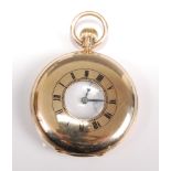 A 9ct yellow gold half hunter keyless wind pocket watch, having white enamel Roman dial and