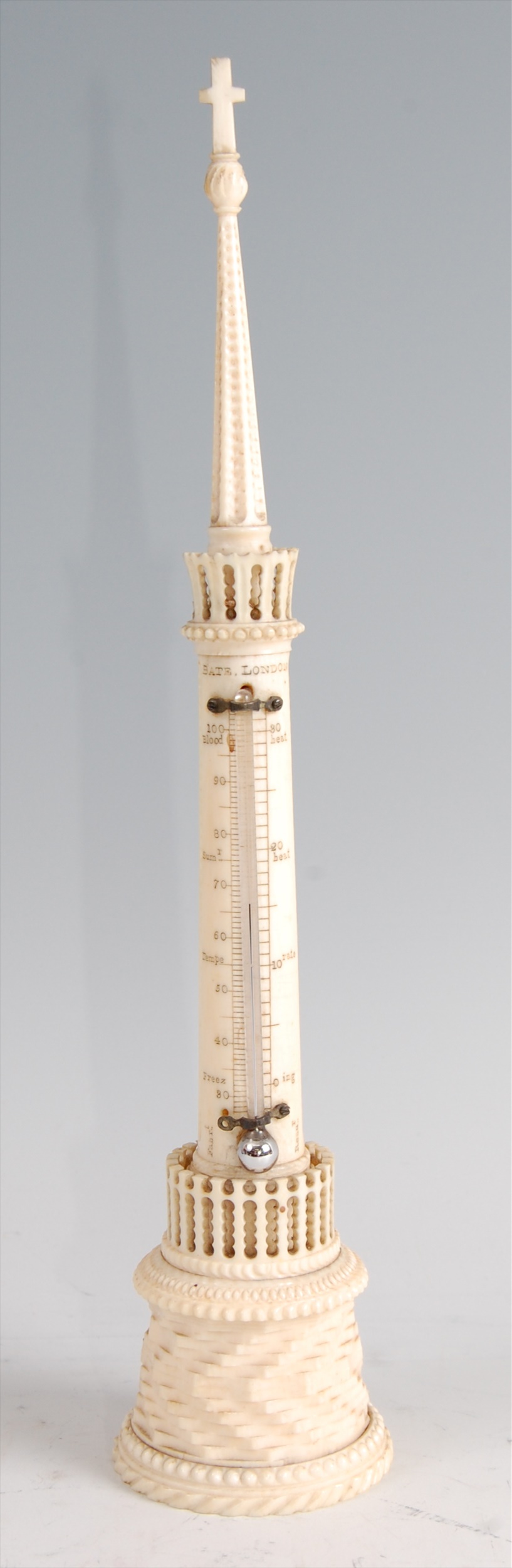 Bate of London - a Victorian carved ivory thermometer modelled as a church spire, signed, h.23.5cm