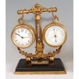 A late Victorian gilt metal nautical desk-top compendium clock barometer, composed of a central