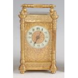 A circa 1900 French lacquered brass carriage clock, having a white enamel chapter ring with Arabic