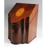 A George III mahogany and inlaid fitted knife box, of serpentine outline with chequer stringing, w.