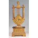 A mid-19th century French gilt metal lyre shaped mantel clock by Guyerdet of Paris, the whole