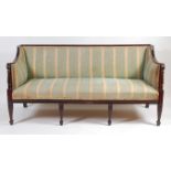 A 19th century mahogany framed settee, the whole upholstered in a striped silk damask, the moulded