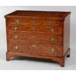 A figured walnut and crossbanded bachelors chest, in the mid-18th century style, the fold-over top