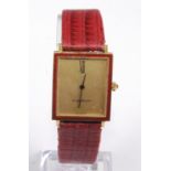 A Gents 18ct yellow gold Jaeger le Coultre manual wind wristwatch, having a rectangular champagne