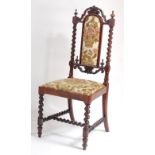 A Victorian rosewood childs chair, having woolwork upholstered padback and stuffover seat, spiral