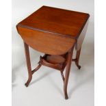 A circa 1900 walnut dropflap occasional table, raised on reeded square supports united by platform