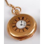 A Gent's 18ct yellow gold half hunter keyless wind pocket watch, having round white Roman dial and