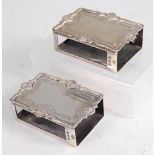 A pair of Edward VIII silver matchbox sleeves, each having shell cast wavy rims, 3.7oz, maker