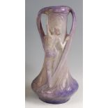 Koenig & Lengsfeld - a large Art Nouveau plaster twin handled vase, decorated with a reverse study