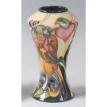 A modern Moorcroft pottery vase, decorated with birds, of angular shouldered and waisted form,