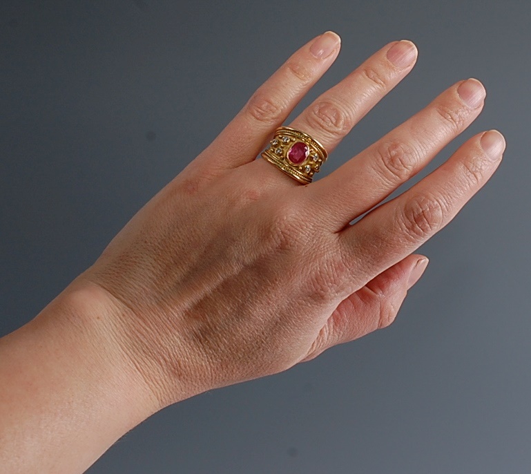 A 1970s 18ct yellow gold, pink sapphire and diamond Etruscan style dress ring by Elizabeth Gage, - Image 5 of 7