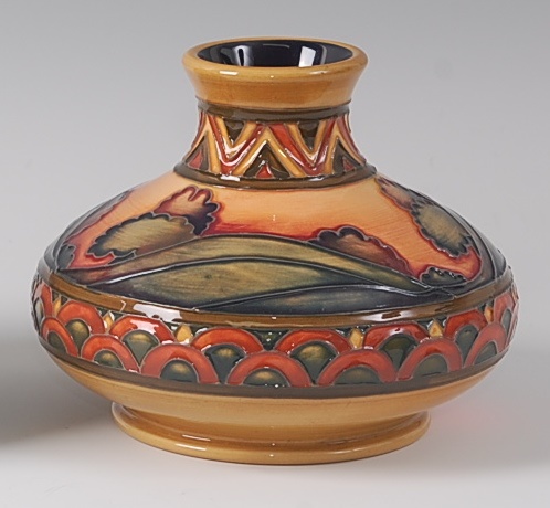 A modern Moorcroft pottery vase in the Second Dawn Eventide pattern, designed by Kerry Goodwin, of