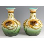 A pair of large Art Nouveau pottery vases, in the style of William Morris, each underglaze floral