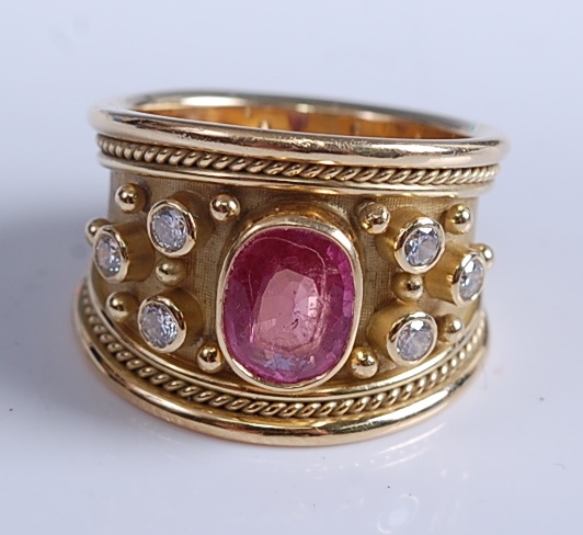 A 1970s 18ct yellow gold, pink sapphire and diamond Etruscan style dress ring by Elizabeth Gage,