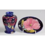 A Moorcroft pottery miniature shouldered tapering vase in the Anemone pattern, underglaze painted